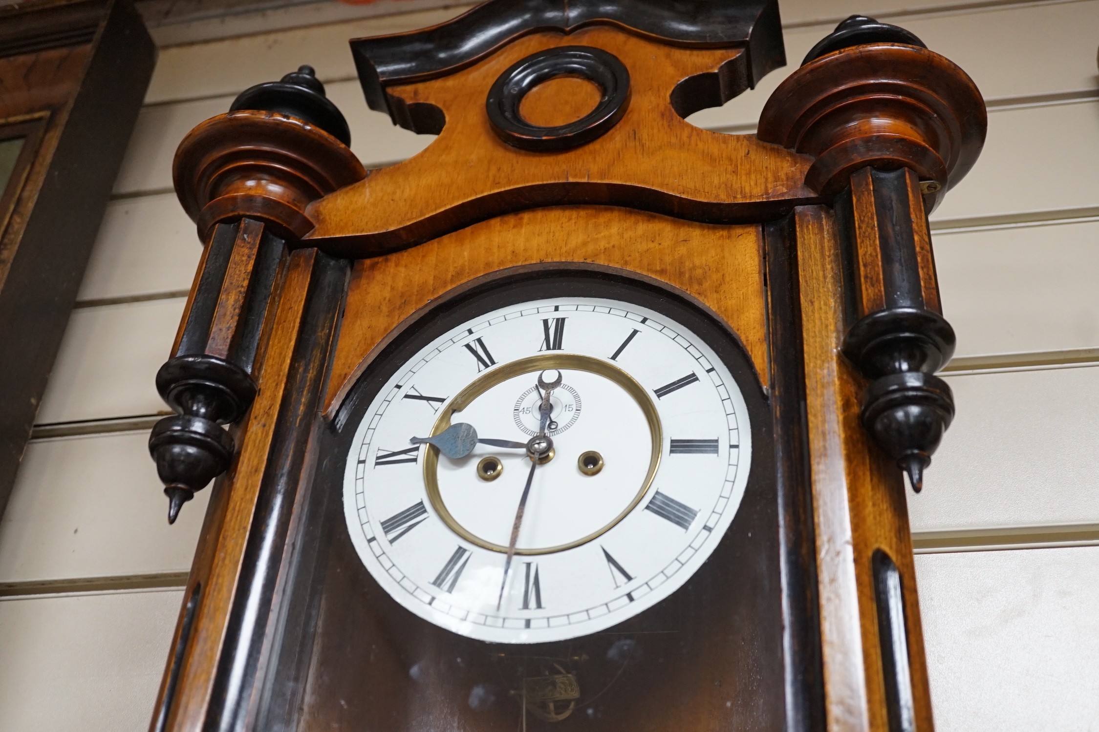 A late 19th century walnut and ebonised Vienna wall clock, height 118cm *Please note the sale commences at 9am.
